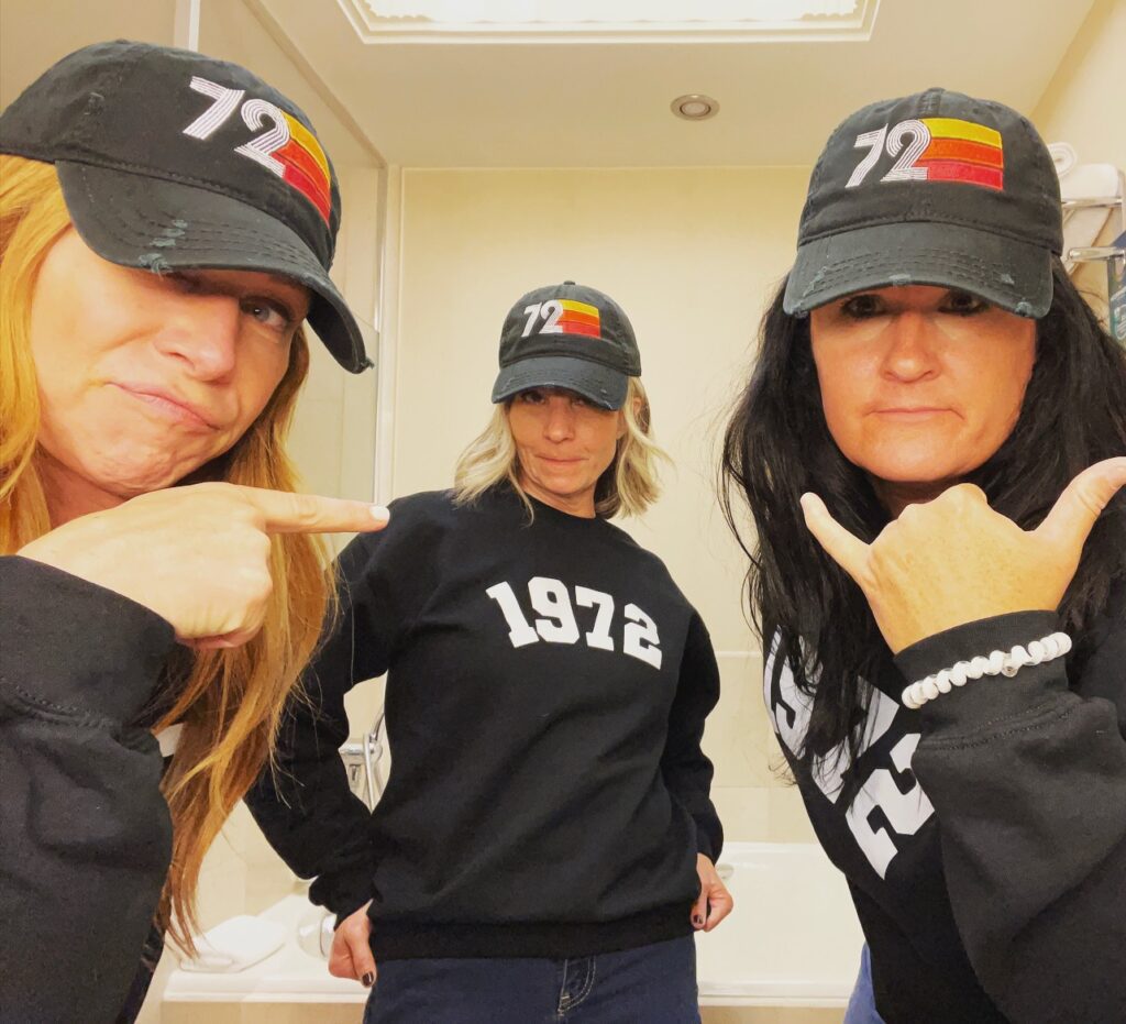 three funny ladies wearing 1972 shirts and hats celebrating their 50th birthdays